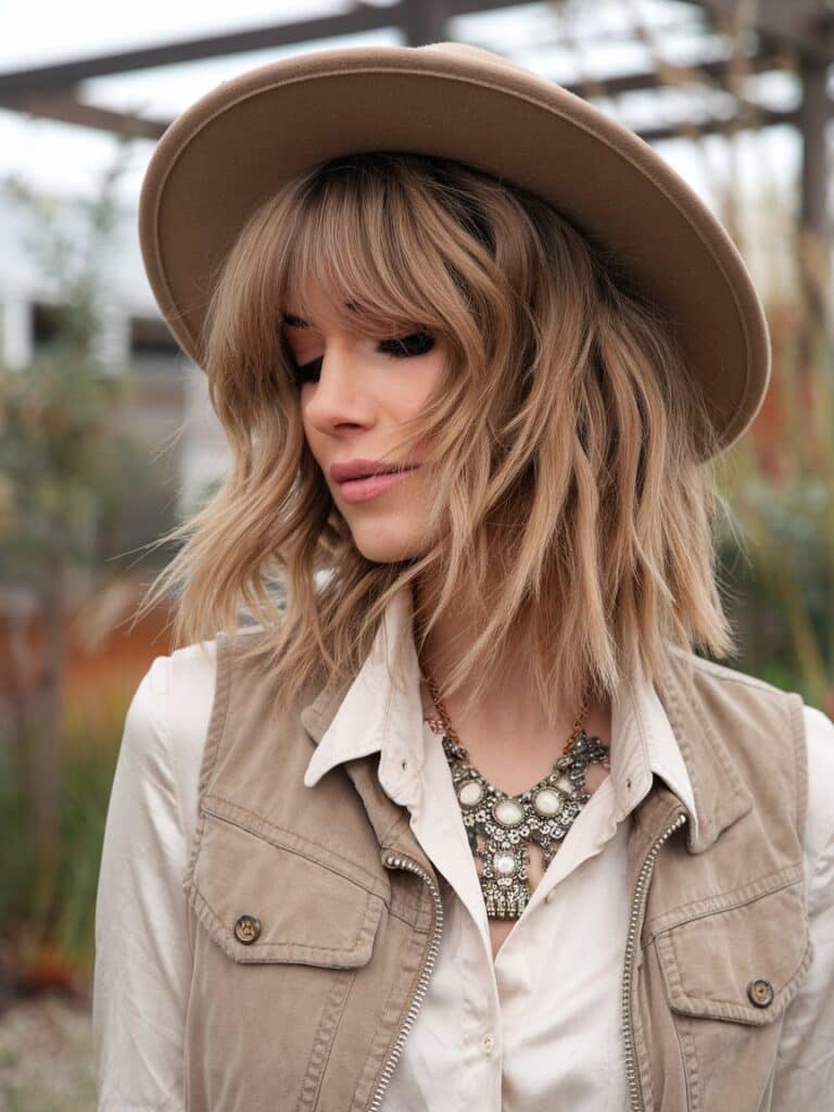 3. Bohemian Chic: Wavy Layers with Textured Full Fringe